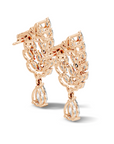 Rose gold earrings with intricate design