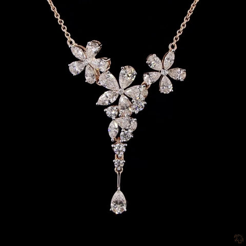 Awaken’s Pear Patel Elegance:  Flower Diamond Pendant