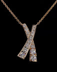 Awaken’s Dazzling Embrace:  'X' Diamond Necklace