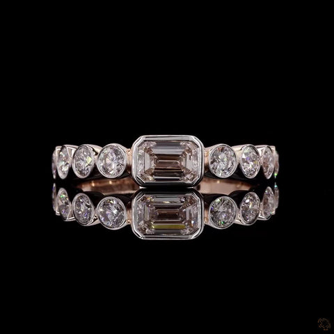 Awaken’s Regal Brilliance: Emerald-Cut and Bezel Diamond Band