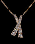 Dazzling Embrace: 'X' Diamond Necklace