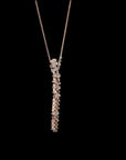 Awaken’s Pear Blossom: Long  Floral Diamond Pendant