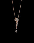 Awaken’s Pear Patel Elegance:  Flower Diamond Pendant