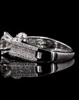 Dazzle Crown: Solitaire Diamond Ring with Princess Cut Accents