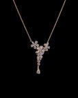 Awaken’s Pear Patel Elegance:  Flower Diamond Pendant