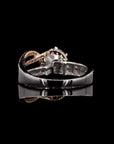 Symphony Solitaire: Two-Tone Diamond Ring with Side Diamonds