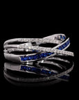 Sapphire Skies Radiance: Criss Cross Diamond Ring