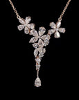 Awaken’s Pear Patel Elegance:  Flower Diamond Pendant