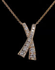 Awaken’s Dazzling Embrace:  'X' Diamond Necklace