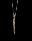 Awaken’s Pear Blossom: Long  Floral Diamond Pendant