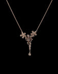 Awaken’s Pear Patel Elegance:  Flower Diamond Pendant