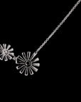 Awaken’s Monochrome Elegance: Diamond Sunflower Necklace