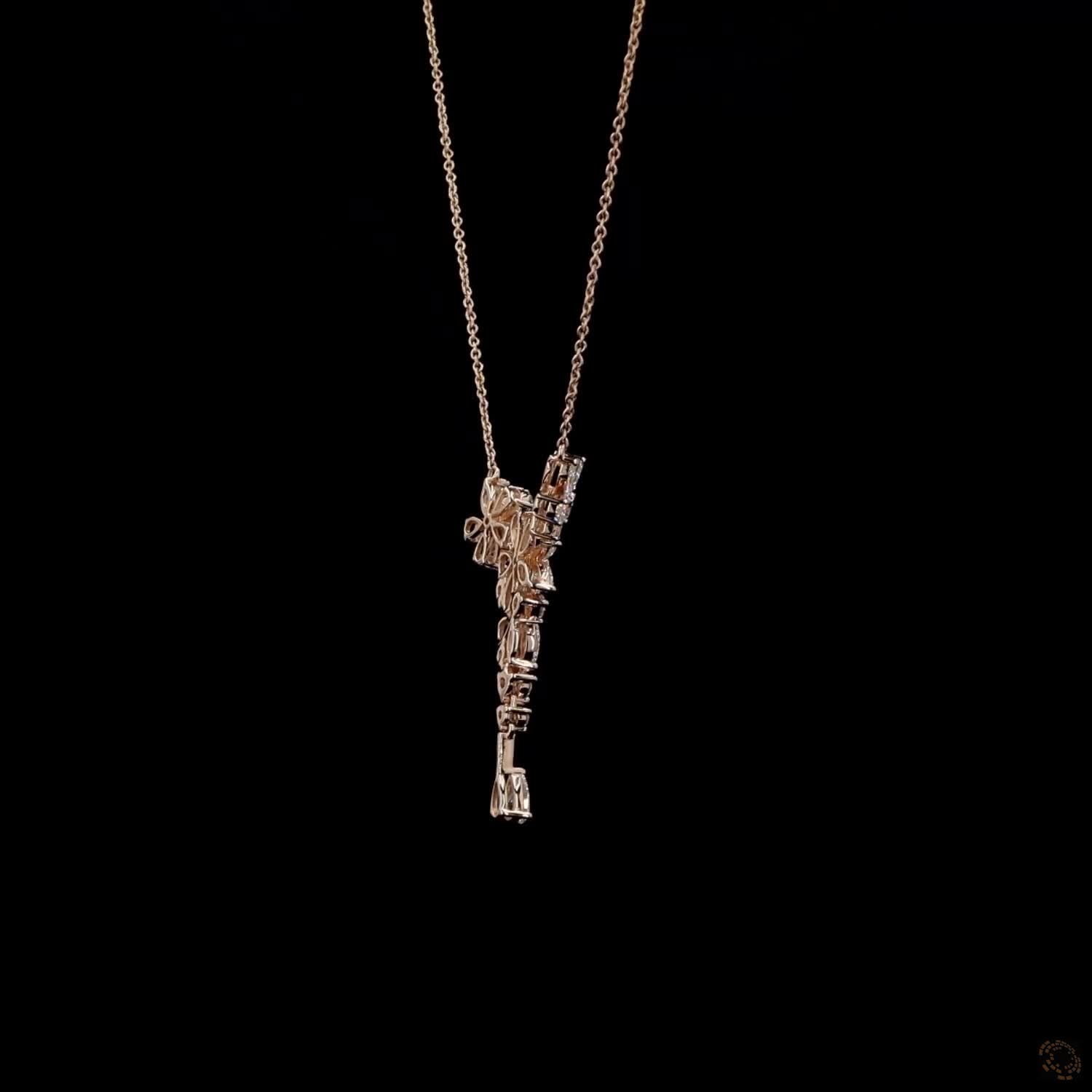 Awaken’s Pear Patel Elegance:  Flower Diamond Pendant