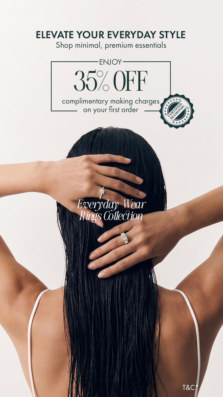 Back view of woman wearing everyday diamond rings with hands in hair, showcasing minimalist ring styling for daily wear looks