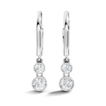 white gold lab grown diamond earrings with three round gemstone