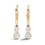 Minimal yellow gold lab grown earrings featuring double round diamond drops