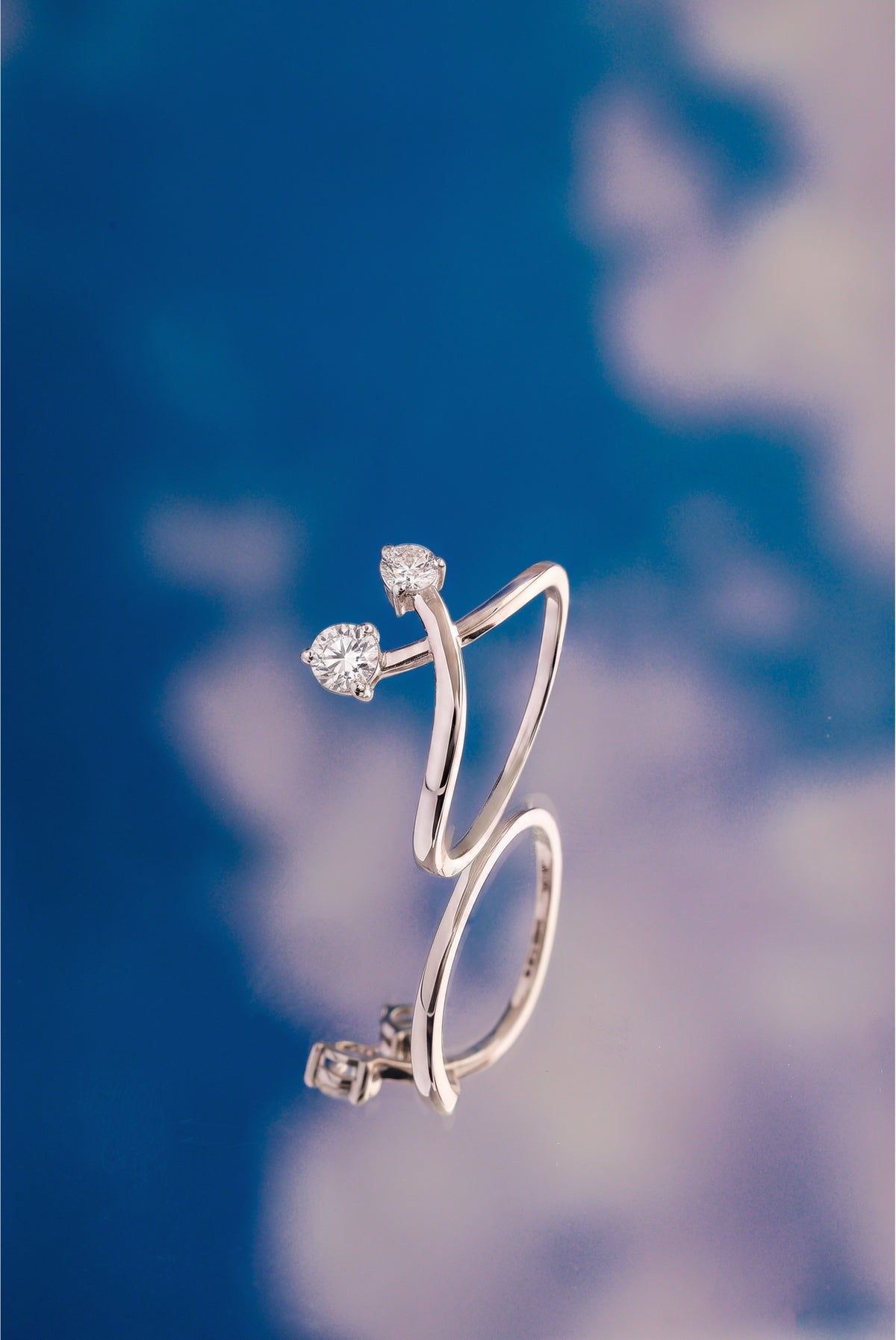 Diverge Ring Round Lab Grown Diamond Two Stone Crossing Arms