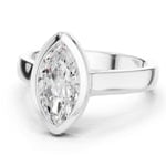 white gold lab grown diamond ring designed with a tapered marquise stone and modern contour.